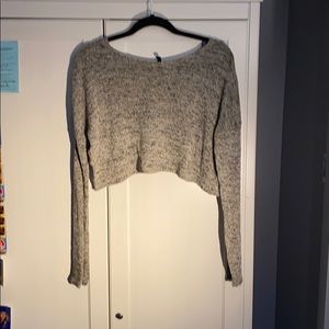 cropped gray sweater, open criss cross back.